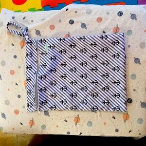 Wet bag.  Baby beach bag !